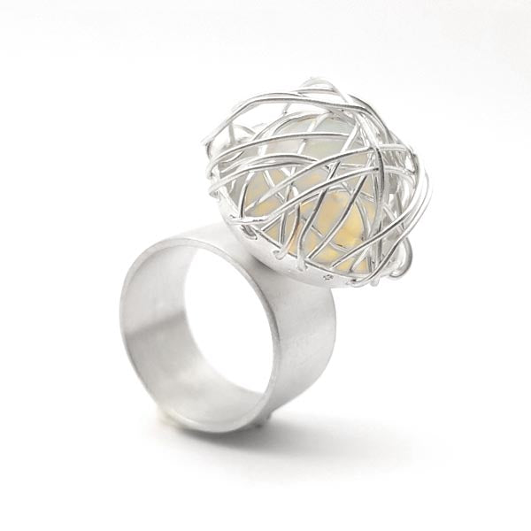 Tezer - High wire caged moonstone ring