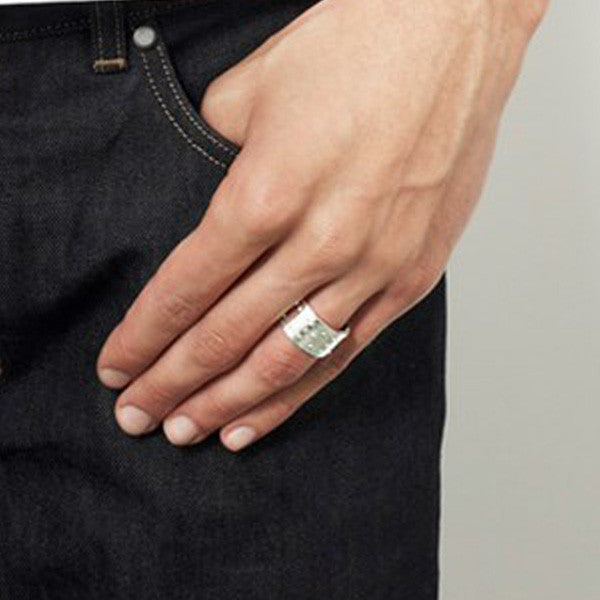 Braille ring on male model by Efva Attling, Stockholm