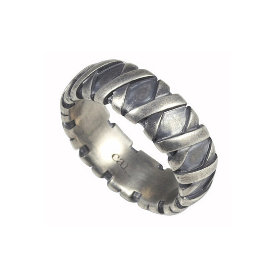 stylish silver ring with wrapped effect- bound texture
