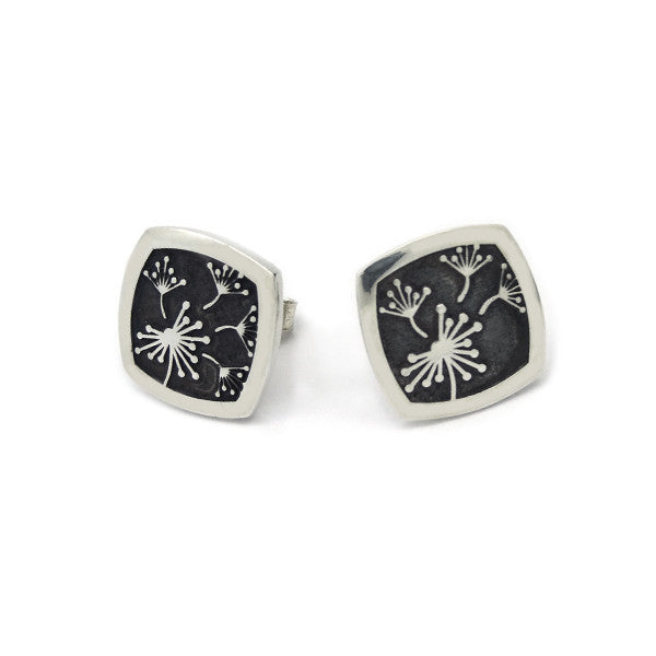 Softened square stud earrings with a dandelion seed pattern
