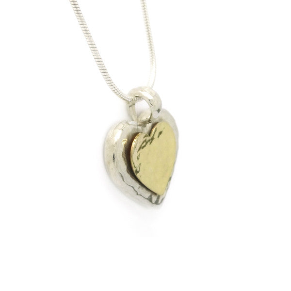 Talma Keshet heart pendant in silver with gold centre heart detail