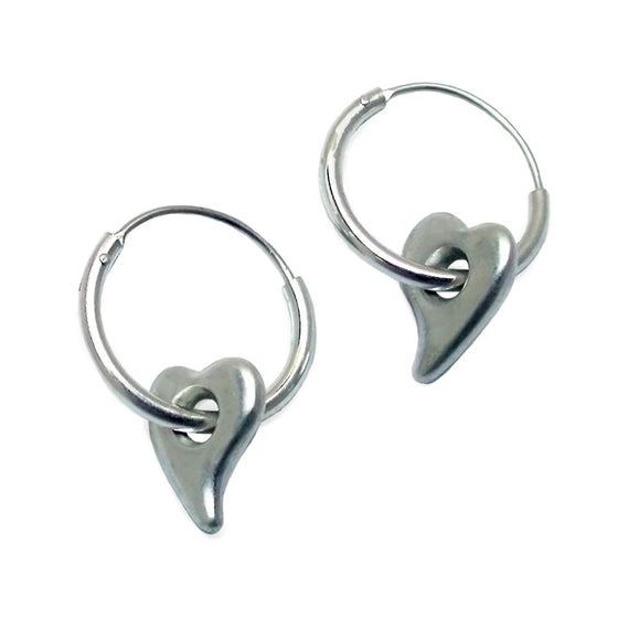 solid silver hanging heart sleeper earrings by Annika Rutlin