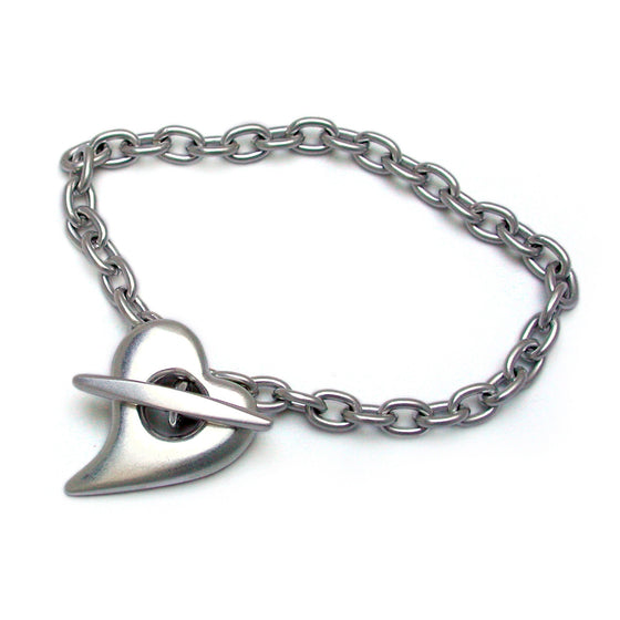 heavy weight silver chain with T-bar passing through the heart