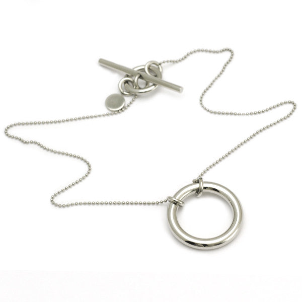Calvin Klein elegant circle pendant on a T-bar chain in steel
