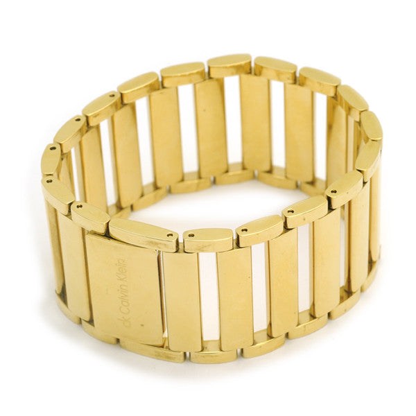 Glamorous wide gold bracelet; statement piece jewellery