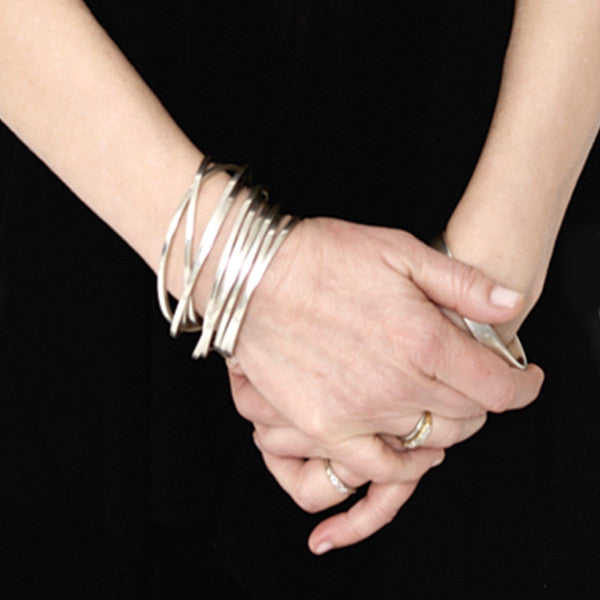 Inger Moss wears Annika Rutlin interlinked silver bangles