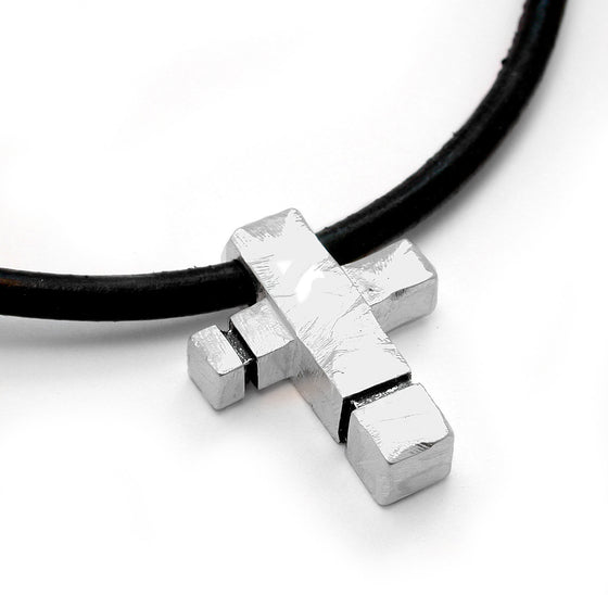 Heavy solid silver rough textured mens cross on leather