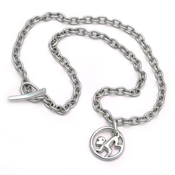 silver chain necklace with modern monkey zodiac pendant by Annika Rutlin